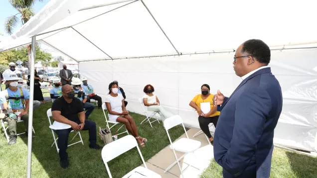 Councilmember Ridley-Thomas speaking to audience of stakeholders under tent